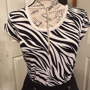 White House Black Market zebra print t shirt
Size S rouched sides